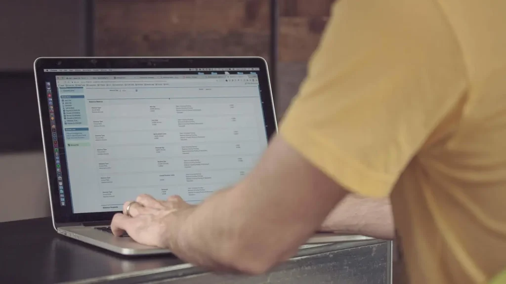 Man typing on laptop